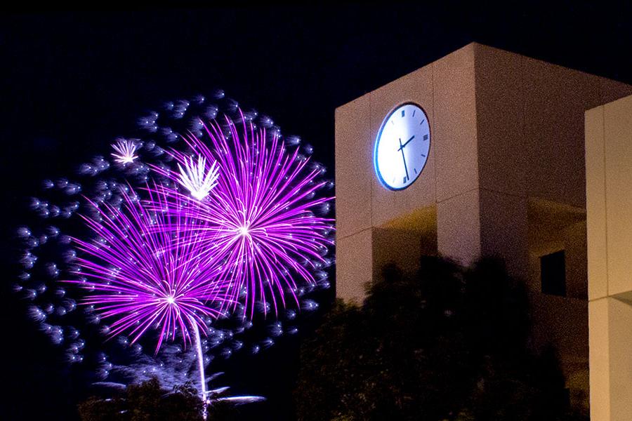 SJC Clocktower and purple fireworks